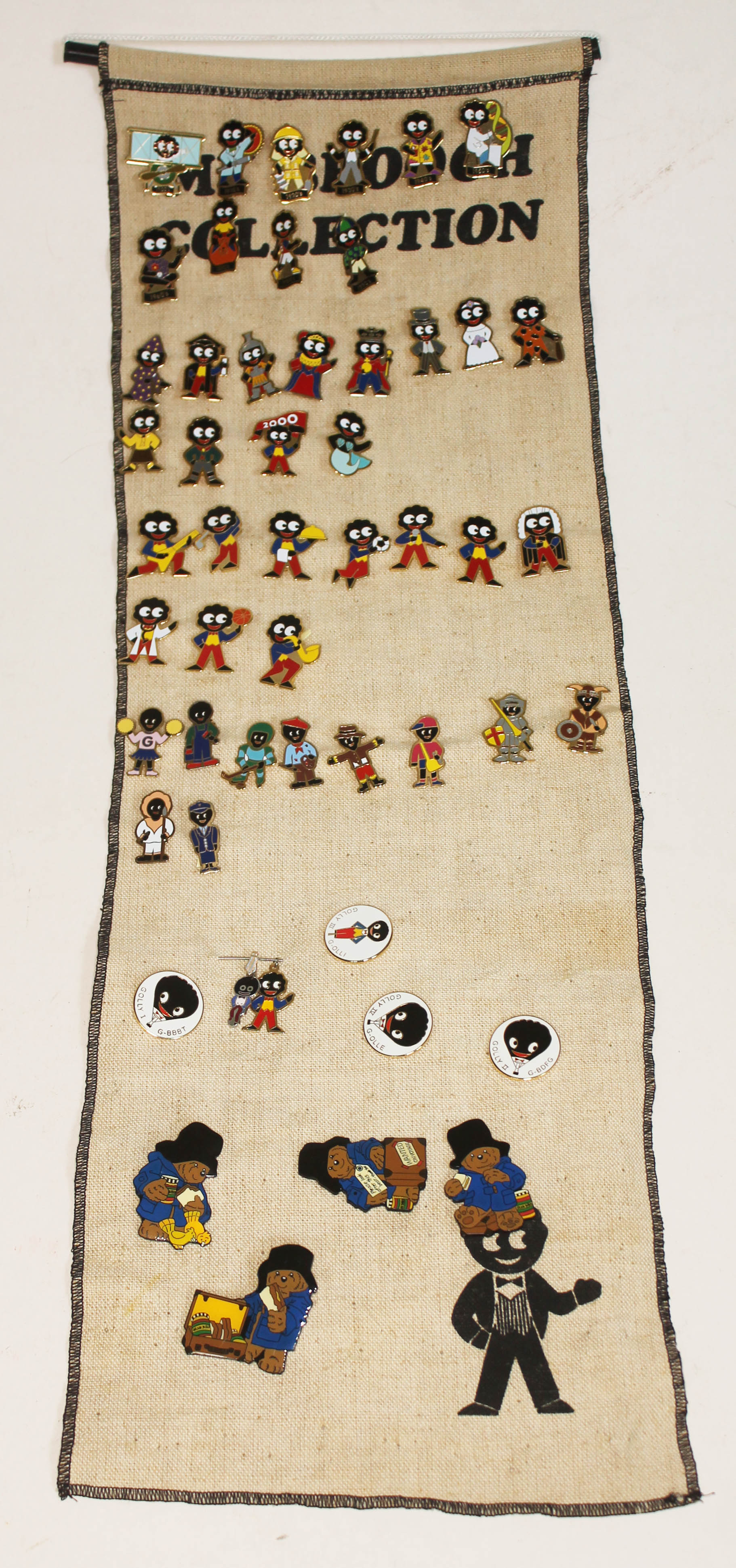 A collection of approx. 50 Robertsons Golly and Paddington badges.