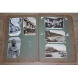 A scrap book album including postcards, approx. 50.