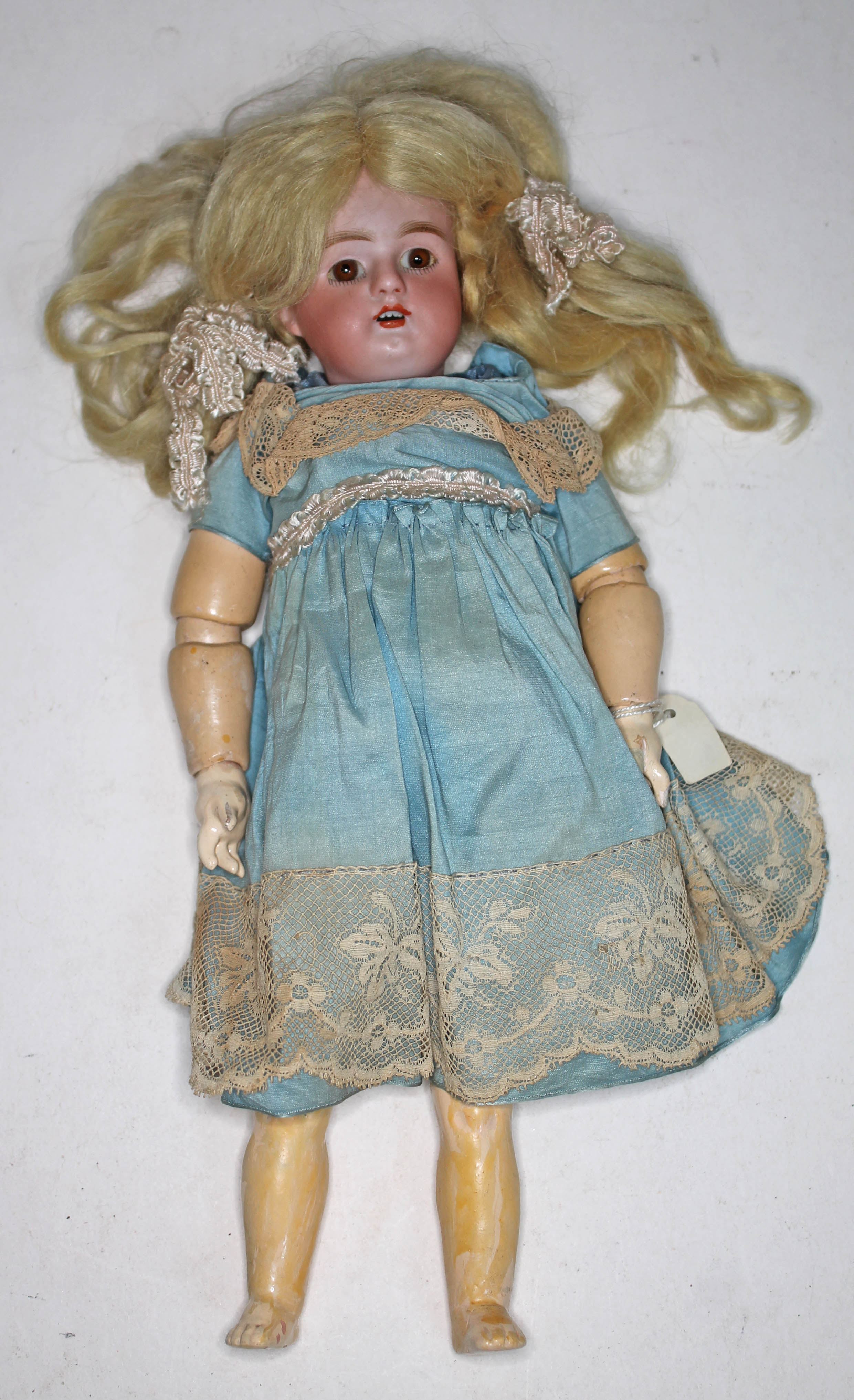 An early 20th century German bisque doll Heinrich Handwerck, Germany, Halbig, with glass static