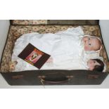 A vintage case containing two vintage 80's Alresford bisque dolls. Height / Length : 1st doll - 41