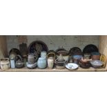 A shelf of approx. 40 pieces of mainly studio pottery, various potters and studios.