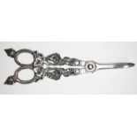 A pair of Victorian silver plated grape scissors with fox head finials.