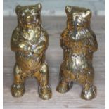 A pair of cast brass monkey boxes formed as bears standing on hind legs, height 15cm.