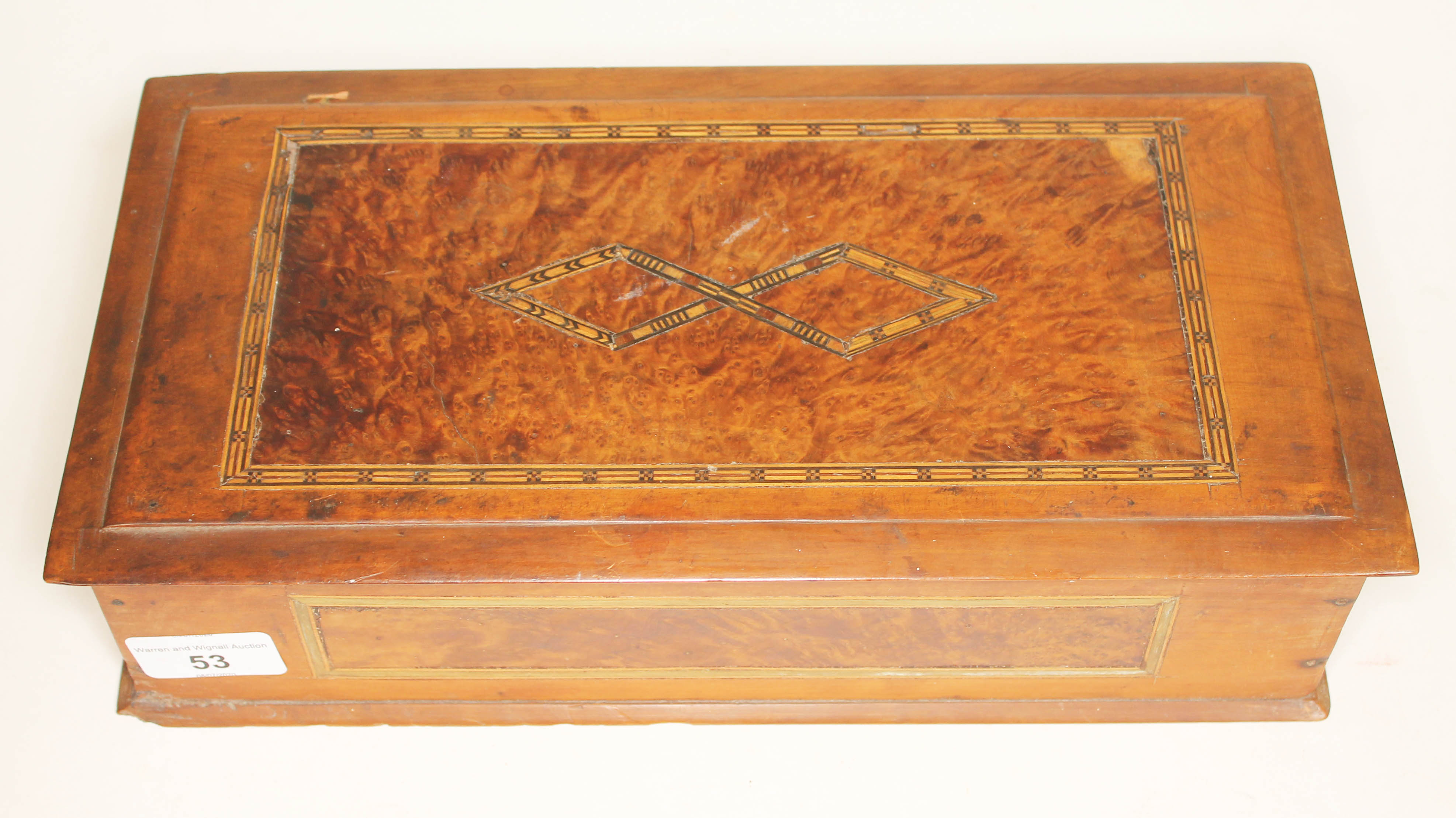 A mixed wood parquetry inlaid box, length 33cm.