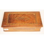 A mixed wood parquetry inlaid box, length 33cm.