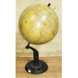 A large Divine terrestrial globe by Divine, height 78cm.