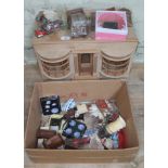 A single storey dolls house together with a box of furniture and accessories.