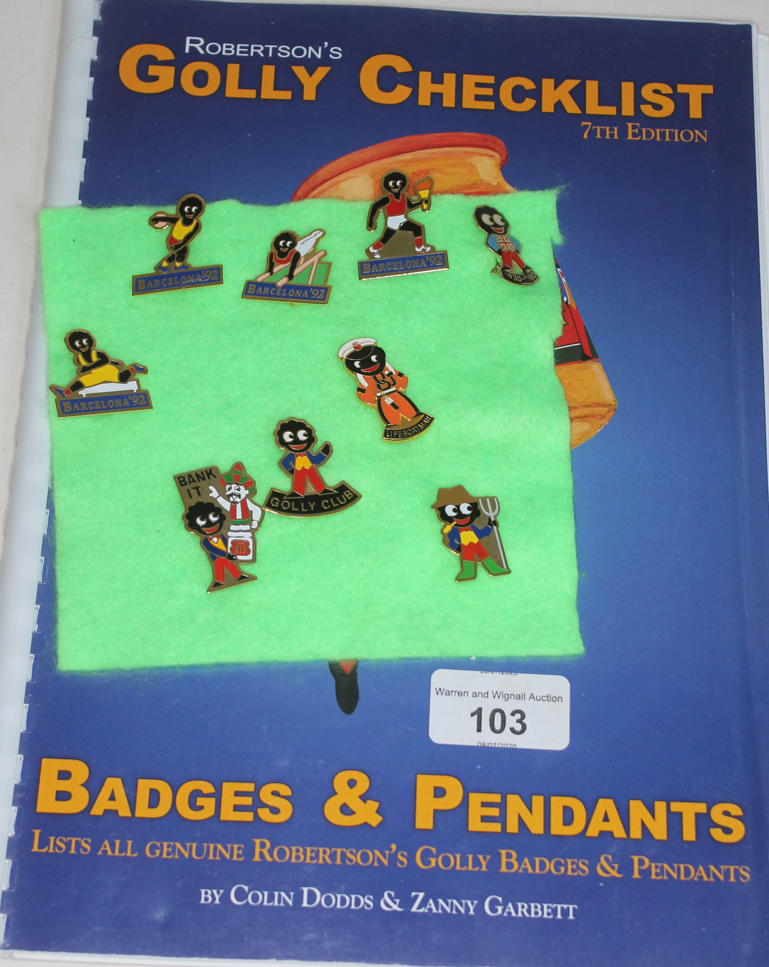 A collection of nine Robertson's Golly badges with Golly Checklist 7th edition booklet.