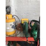 Two electric hedge trimmers and a Hozelock pump action sprayer