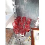 Eleven Victorian cranberry drinking glasses