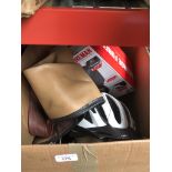 A box of items including George Foreman grill, bike helmet, etc