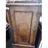 A Victorian walnut pot cupboard.