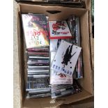 A box of cds and dvds