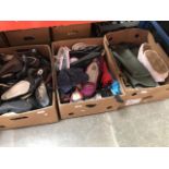 Three boxes of mainly shoes