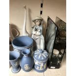 Three Nao figures (one broken) four Wedgwood Jasper pieces and a candle stand