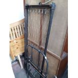 A childs vintage metal bed frame