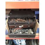 An old multi drawer tool box and tools
