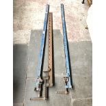 Three large sash clamps