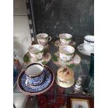 Four Minton small cups and saucers, two Worcester cups and saucers and a Worcester box