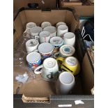 A box of pottery mugs