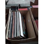 Box of LP records and 45s singles