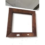 A 19th century walnut picture frame.