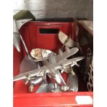 A box of desk model airplanes
