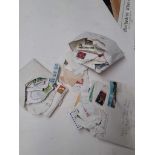 Three packets of loose stamps
