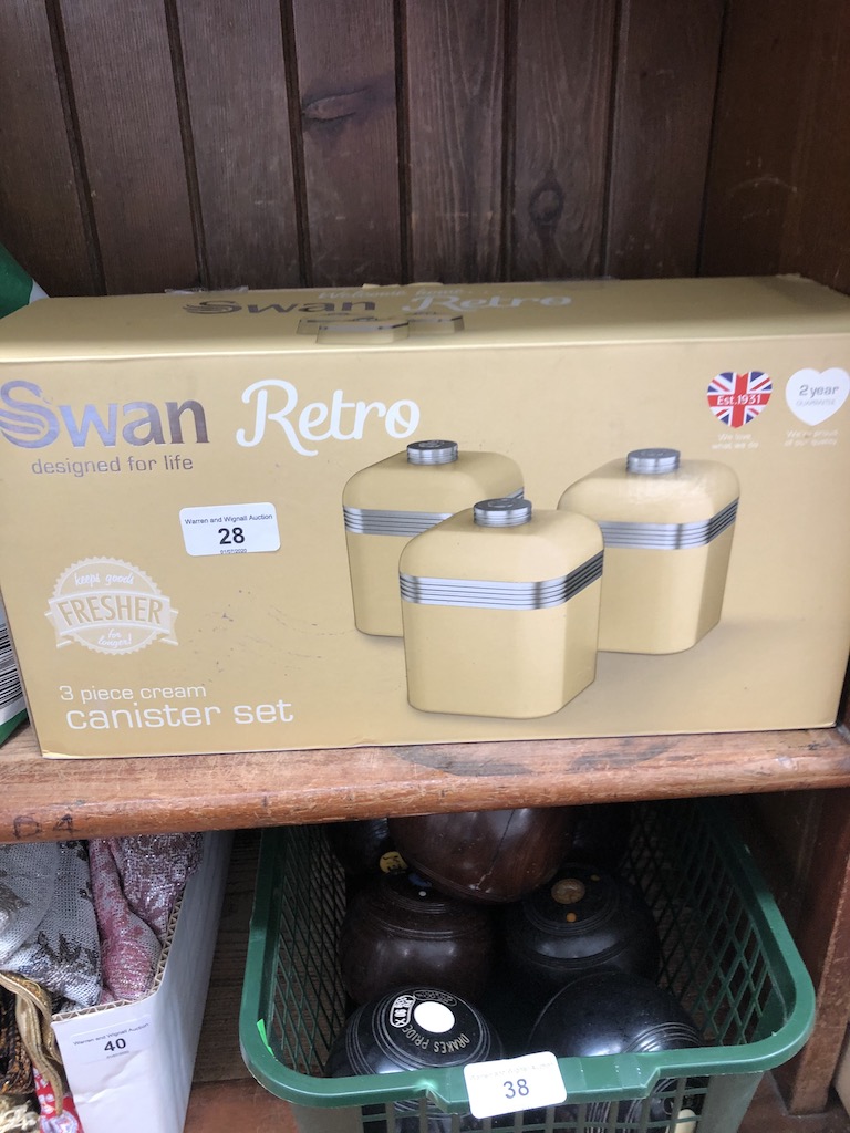 A boxed Swan Retro 3 piece cream canister set.