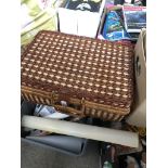 A wicker picnic hamper set