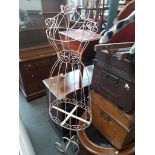 A wire dress maker's ornamental dummy.