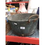 A large brass jam pan