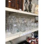 Selection of glassware inc. 13 decanters
