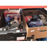 Two boxes of tins, electricals, portable sewing machine, etc