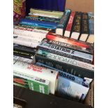 A box of mixed novels and fictional books