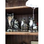 4 cast door stops - 3 cats and a vintage car.