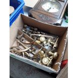 Box of brass door handles and knobs