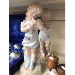 A pair of porcelain German figures