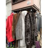 A ladies fur coat, three sheep skin jackets and two leather jackets