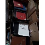 Two boxes of stamp albums