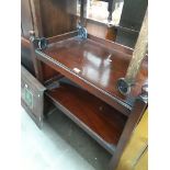 A 19th century rosewood two tier trolley