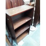 A bookcase and an oak table