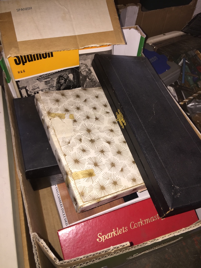 Box with foot warmer, boxed fish servers and other boxed items