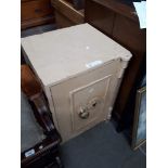 A small wrought iron safe - with key