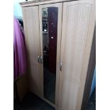 A light wood effect modern triple wardrobe