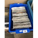 A crate of vinyl singles.