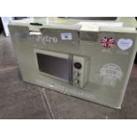 A Swan Retro green microwave 20L capacity - spares or repairs only ( doesn't heat ) possibly a