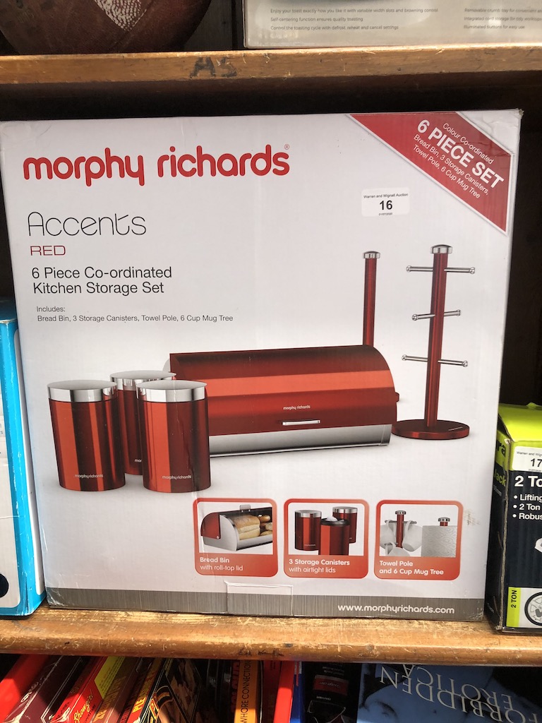 A boxed Morphy Richards Accents red 6 piece co-ordinated kitchen storage set.