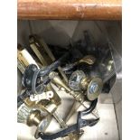 A box of mainly brass hardware to include glass door knobs.