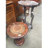 A carved side table together with a turned oak wine table with leather top.